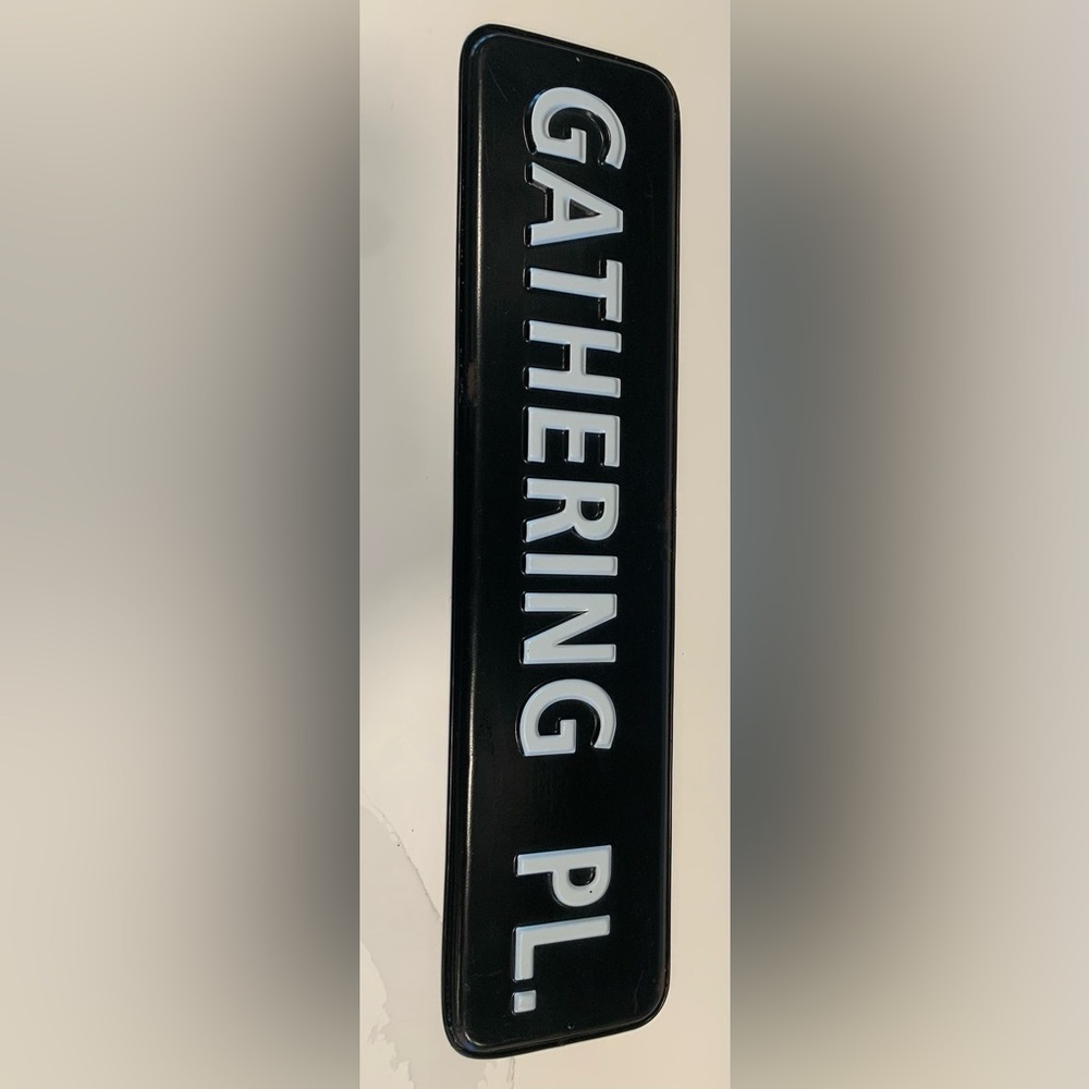 “GATHERING PL.” metal sign